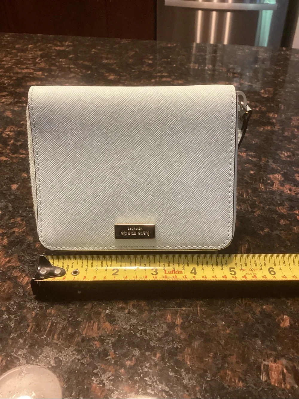 kate spade pale blue small flap wallet with gold plaque